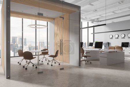 Photo for Corner of modern open space office with gray and wooden walls, concrete floor, computer desks with beige chairs, clocks showing world time and cozy conference room with round table. 3d rendering - Royalty Free Image