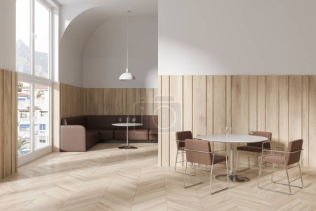 Téléchargez les photos : Intérieur restaurant en bois et blanc avec table et chaises, cloison et canapé en cuir marron près de la fenêtre panoramique. Hall d'hôtel avec espace repas. rendu 3D - en image libre de droit