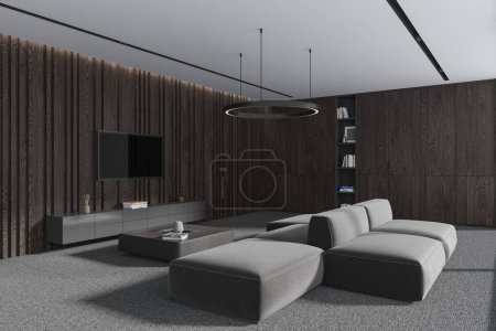 Photo for Corner of stylish living room with dark wooden walls, carpeted floor, comfortable gray couch standing near square coffee table and flat screen TV set hanging on wall. 3d rendering - Royalty Free Image