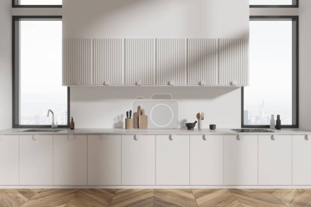 Foto de Acogedor interior de la cocina del hogar con armario, fregadero y estufa con utensilios de cocina. Ventana panorámica de los rascacielos de París. Cuarto de cocina en apartamento con estilo. Renderizado 3D - Imagen libre de derechos