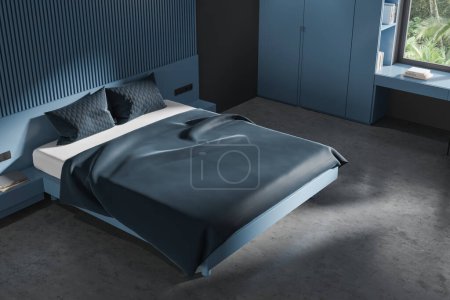 Foto de Vista superior del elegante interior del dormitorio con paredes grises y azules, suelo de hormigón, cómoda cama king size, armario azul y mesa de pie cerca de la ventana. renderizado 3d - Imagen libre de derechos