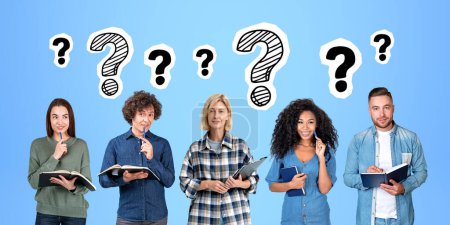Photo for Group of multiracial college or university students standing in row over blue background with question mark sketches above them. Concept of planning, brainstorming and teamwork - Royalty Free Image