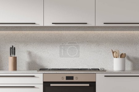 Foto de Interior de cocina moderna con paredes blancas, armarios blancos y acogedores armarios blancos con cocina y horno empotrados. renderizado 3d - Imagen libre de derechos