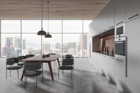 Foto de Interior de la cocina de casa oscura con mesa de comedor y sillas, armario de cocina con horno y utensilios de cocina, mesa de comedor y ventana panorámica en los rascacielos Kuala Lumpur. Renderizado 3D - Imagen libre de derechos