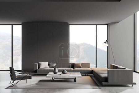 Foto de Interior de la habitación relax oscuro con sofá y sillón, mesa de centro con decoración minimalista y alfombra en piso de hormigón gris. Chill lugar con ventana panorámica en el campo. Renderizado 3D - Imagen libre de derechos