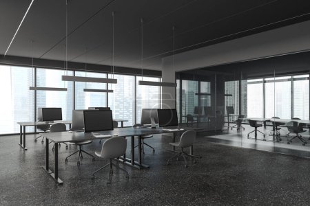 Photo for Corner of stylish open space office with gray walls, concrete floor, rows of computer tables with gray chairs and meeting room with long conference table next to it. 3d rendering - Royalty Free Image