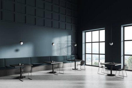Photo for Dark blue restaurant interior with dining table and chairs in row, side view concrete floor. Minimalist coffee shop design with sofa near panoramic window on countryside. 3D rendering - Royalty Free Image
