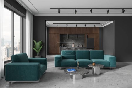 Foto de Elegante estudio interior con sofá y mesa de centro, mesa de comedor con armario de cocina y nevera. Ventana panorámica de los rascacielos Kuala Lumpur. Renderizado 3D - Imagen libre de derechos