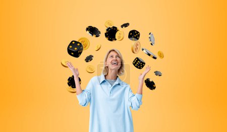 Photo for Astonished woman with raised and open hand palms, looking up at falling dollar coins and dice with poker chips on orange background. Concept of jackpot, luck and success - Royalty Free Image