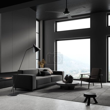 Foto de Esquina de la elegante sala de estar con paredes grises, suelo de hormigón, cómodo sofá gris y sillón de pie en la alfombra cerca de la mesa de centro redonda. renderizado 3d - Imagen libre de derechos