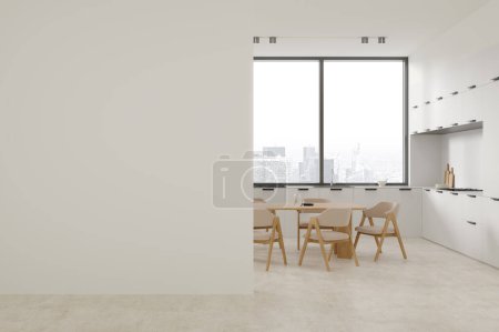 Photo for Interior of modern kitchen with white walls, concrete floor, comfortable white cabinets and long dining table with white chairs. Copy space wall on the left. 3d rendering - Royalty Free Image