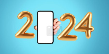 Foto de Mano de hombre sosteniendo un teléfono con gran pantalla de simulacro vacío, números dorados 2024 sobre fondo azul. Concepto de venta de vacaciones, compras en línea y año nuevo - Imagen libre de derechos