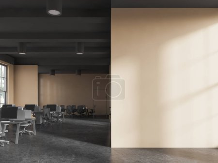 Photo for Interior of stylish open space office with beige walls, gray ceiling, row of computer desks, conference room in background and copy space wall on the right. 3d rendering - Royalty Free Image