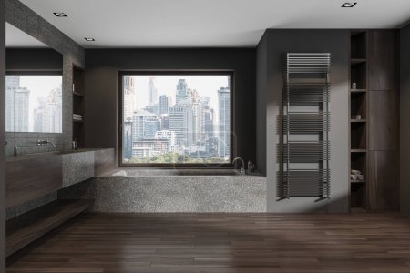 Photo for Dark hotel bathroom interior with bathtub, sink, mirror and shelf with accessories, towel rail ladder and hardwood floor. Panoramic window on Bangkok skyscrapers. 3D rendering - Royalty Free Image
