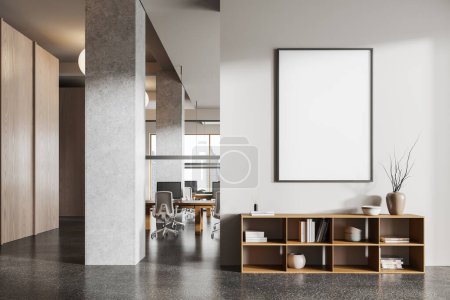 Photo for Entrance of coworking interior with sideboard, mock up canvas poster on partition. Workspace with armchairs and desk with pc computers in row, panoramic window on skyscrapers. 3D rendering - Royalty Free Image
