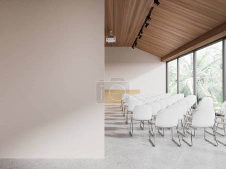 Photo for Interior of modern lecture hall with white walls, concrete floor, rows of white chairs and wooden lecturers table. Copy space wall on the left. 3d rendering - Royalty Free Image