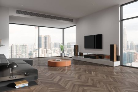 Foto de Esquina de la moderna sala de estar con paredes blancas, suelo de madera, acogedor sofá gris de pie cerca de la mesa de café redonda y televisor colgando de la pared. renderizado 3d - Imagen libre de derechos