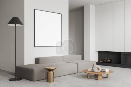 Photo for Luxury home living room interior with sofa, fireplace and coffee table with decoration on concrete floor. White relax corner with mock up blank square poster. 3D rendering - Royalty Free Image