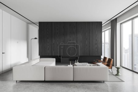Foto de Interior de la moderna sala de estar con paredes blancas y de madera, suelo de hormigón, acogedor sofá blanco y dos sillones de pie cerca de la mesa de café. renderizado 3d - Imagen libre de derechos