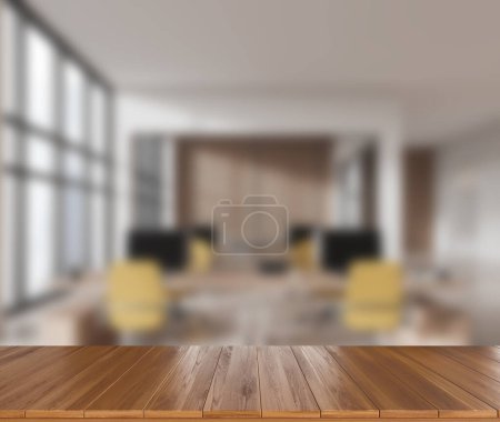 Téléchargez les photos : Bureau vide en bois au premier plan, fond de coworking intérieur flou avec fauteuils et ordinateur PC, loft de bureau avec fenêtre panoramique. Maquette pour l'affichage du produit. rendu 3D - en image libre de droit