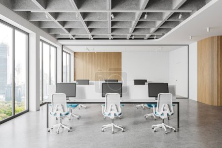 Interior of modern coworking office with white and wooden walls, concrete floor and long computer tables with white chairs. 3d rendering