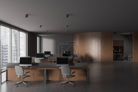 Photo for Dark business interior with meeting space, pc desktop on table in row. Glass conference room with panoramic window on Singapore skyscrapers. 3D rendering - Royalty Free Image