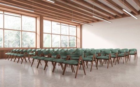 Téléchargez les photos : Coin de la salle de conférence moderne avec murs blancs, sol en béton, rangées de chaises vertes pour les étudiants et fenêtres panoramiques avec vue tropicale. Rendu 3d - en image libre de droit