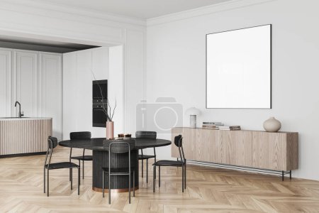 Foto de Esquina de la cocina moderna con paredes blancas, suelo de madera, acogedora isla, mesa de comedor redonda con sillas y mofa cuadrada encima de la cómoda. renderizado 3d - Imagen libre de derechos