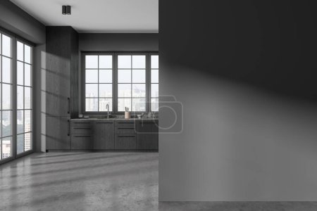 Foto de Interior de la cocina de casa oscura con armario y utensilios de cocina, piso de hormigón gris. Cuarto de cocina en apartamento de lujo con ventana panorámica. Mockup partición de pared vacía. Renderizado 3D - Imagen libre de derechos