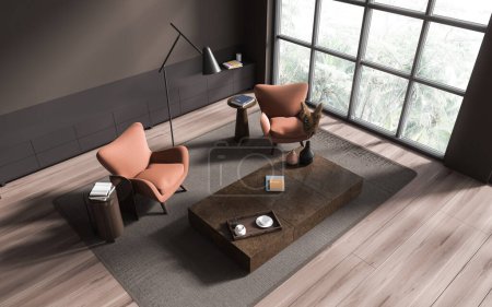 Foto de Vista superior del interior de la sala de estar marrón con dos sillones, cómoda y mesa de centro con decoración, alfombra en piso de madera. Ventana panorámica de los trópicos. Renderizado 3D - Imagen libre de derechos