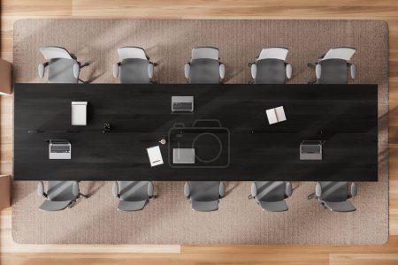 Photo for Top view of office meeting room interior with grey armchairs in row, laptop and notebook on board, carpet on hardwood floor. Ceo conference room with corporate furniture. 3D rendering - Royalty Free Image