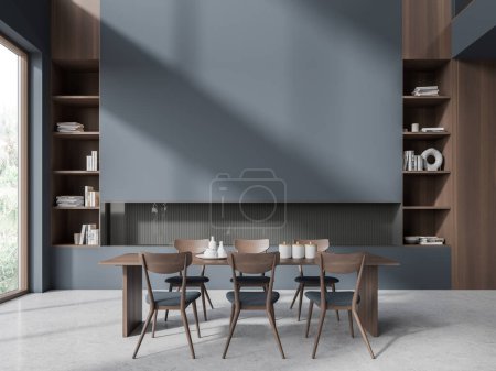 Téléchargez les photos : Dark home living room interior with chairs and table, shelf with decoration. Fireplace and panoramic window on tropics view. Mock up empty blue wall. 3D rendering - en image libre de droit