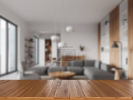 Photo for Wooden mock up empty table on background of blurred living room interior, sofa and shelf with decoration. Panoramic window and copy space for product display. 3D rendering - Royalty Free Image