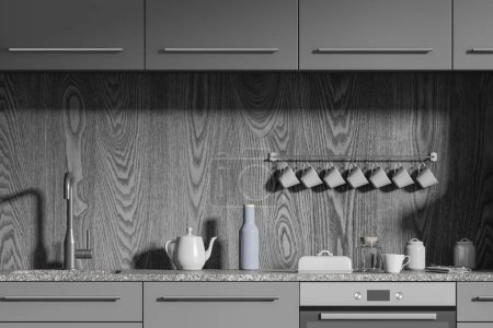 Téléchargez les photos : Dark kitchen interior with black and wooden design, sink and oven with kitchenware on counter. Cozy minimalist cooking space in office or apartment. 3D rendering - en image libre de droit
