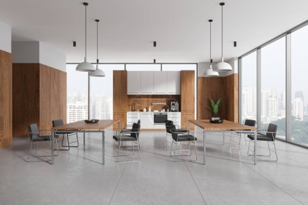 Téléchargez les photos : White and wooden office kitchen interior with tables and chairs in row, tile concrete floor. Cooking cabinet with shelves. Panoramic window on Singapore skyscrapers. 3D rendering - en image libre de droit
