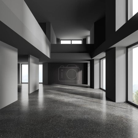Téléchargez les photos : Dark two-storey empty office hall with panoramic window on countryside, grey granite floor. Minimalist corporate loft room for coworking or relaxing space. 3D rendering - en image libre de droit