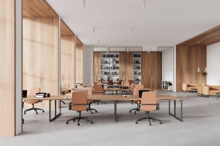 Photo for Stylish office interior coworking zone with laptop on shared desk, armchairs on light concrete floor. Conference room with shelf and documents. 3D rendering - Royalty Free Image