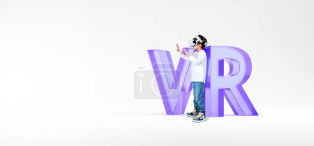 Téléchargez les photos : Child in virtual reality headset, hands touching something on empty copy space background. Large purple glass letters VR. Concept of metaverse, futuristic technology, video games and entertainment - en image libre de droit