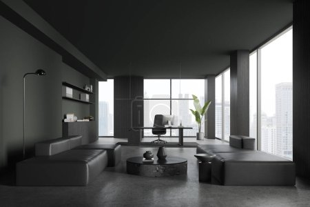 Foto de Dark office room interior with chill zone and leather sofa, pc computer on work table, sideboard with decoration. Panoramic window on Bangkok skyscrapers. 3D rendering - Imagen libre de derechos