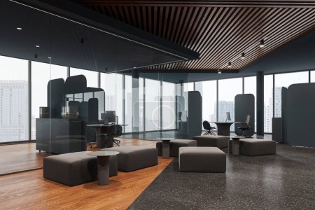 Photo for Dark office interior with coworking and chill corner, divider and glass partition. Side view pc computers on table and modular sofa. Panoramic window on Bangkok skyscrapers. 3D rendering - Royalty Free Image