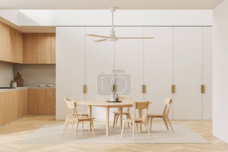 Foto de Interior de la elegante cocina con paredes blancas y de madera, suelo de madera, armarios y armarios de madera y mesa de comedor redonda con sillas. renderizado 3d - Imagen libre de derechos