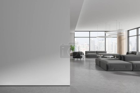 Foto de Moderno vestíbulo interior de oficina con ascensor, sofá modular gris en el pasillo de negocios en piso de hormigón gris. Espacio de espera con ventana panorámica en Singapur. Simular partición de pared vacía. Renderizado 3D - Imagen libre de derechos