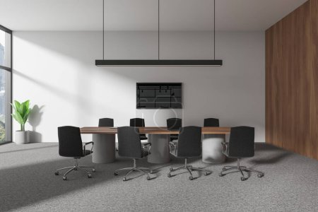 Photo for White and wooden office interior with board and armchairs, laptop and tv display on wall. Business conference space with panoramic window on Bangkok skyscrapers. 3D rendering - Royalty Free Image