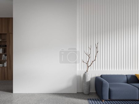 Foto de Interior de la elegante sala de estar con paredes blancas, suelo de hormigón, cómodo sofá azul y la pared del espacio de copia a la izquierda. renderizado 3d - Imagen libre de derechos