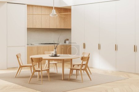 Téléchargez les photos : Vue d'angle de l'intérieur de la cuisine maison beige avec table à manger et chaises, vue latérale tapis sur plancher de bois franc. Coin repas et cuisine avec armoire en bois. rendu 3D - en image libre de droit