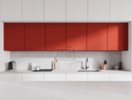Photo for Light stone counter on blurred background of red and white kitchen interior, sink and kitchenware. Mock up copy space for product display. 3D rendering - Royalty Free Image