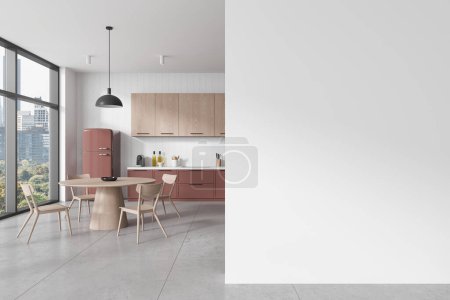 Photo for Interior of modern kitchen with white walls, concrete floor, pink cabinets with built in sink and round dining table with chairs. Copy space wall on the right. 3d rendering - Royalty Free Image