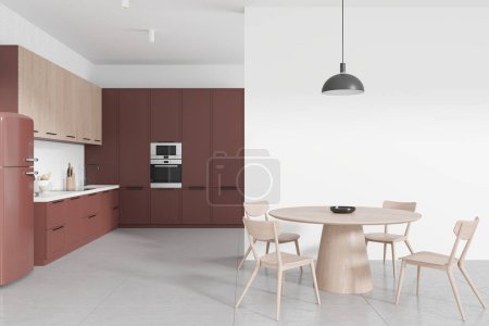 Téléchargez les photos : Intérieur de la cuisine de la maison colorée avec table et chaises, armoire de cuisson rouge avec ustensiles de cuisine, four et réfrigérateur. Espace à manger avec cloison murale blanche. rendu 3D - en image libre de droit