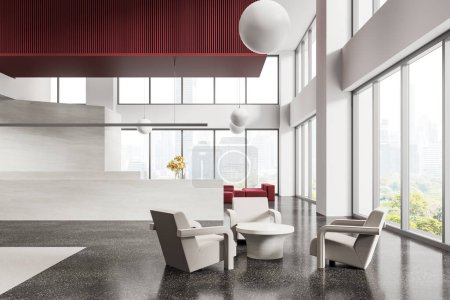 Téléchargez les photos : Intérieur du bureau moderne salle d'attente avec des murs blancs et rouges, sol en béton et fauteuils confortables debout près de la table basse ronde. Rendu 3d - en image libre de droit