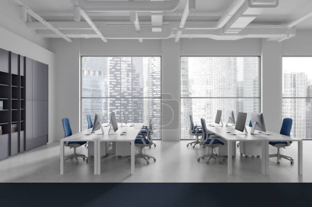Photo for White industrial office interior with pc computers on desk and shelf, light concrete floor. Stylish workplace with panoramic window on Singapore skyscrapers. 3D rendering - Royalty Free Image